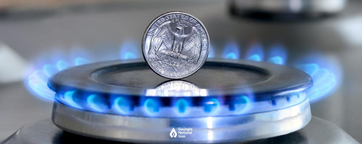 quarter on gas burner with flame on